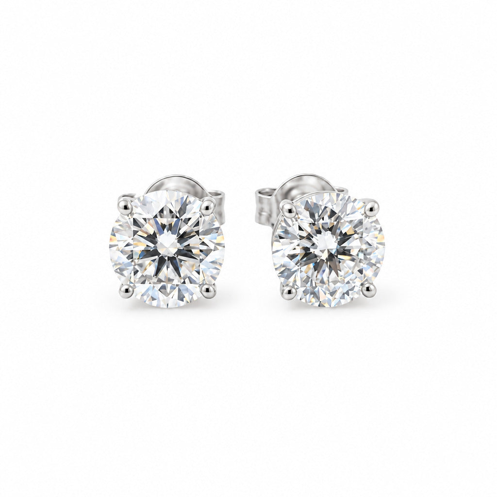 Legacy ørestikkere 2x0,59ct Top Wesselton/Si1