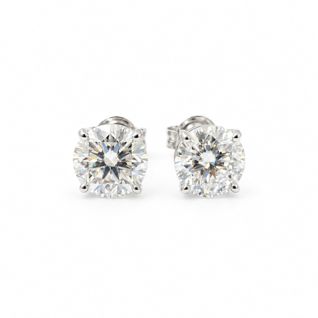Legacy ørestikkere 2x0,62ct Top Wesselton/Si1