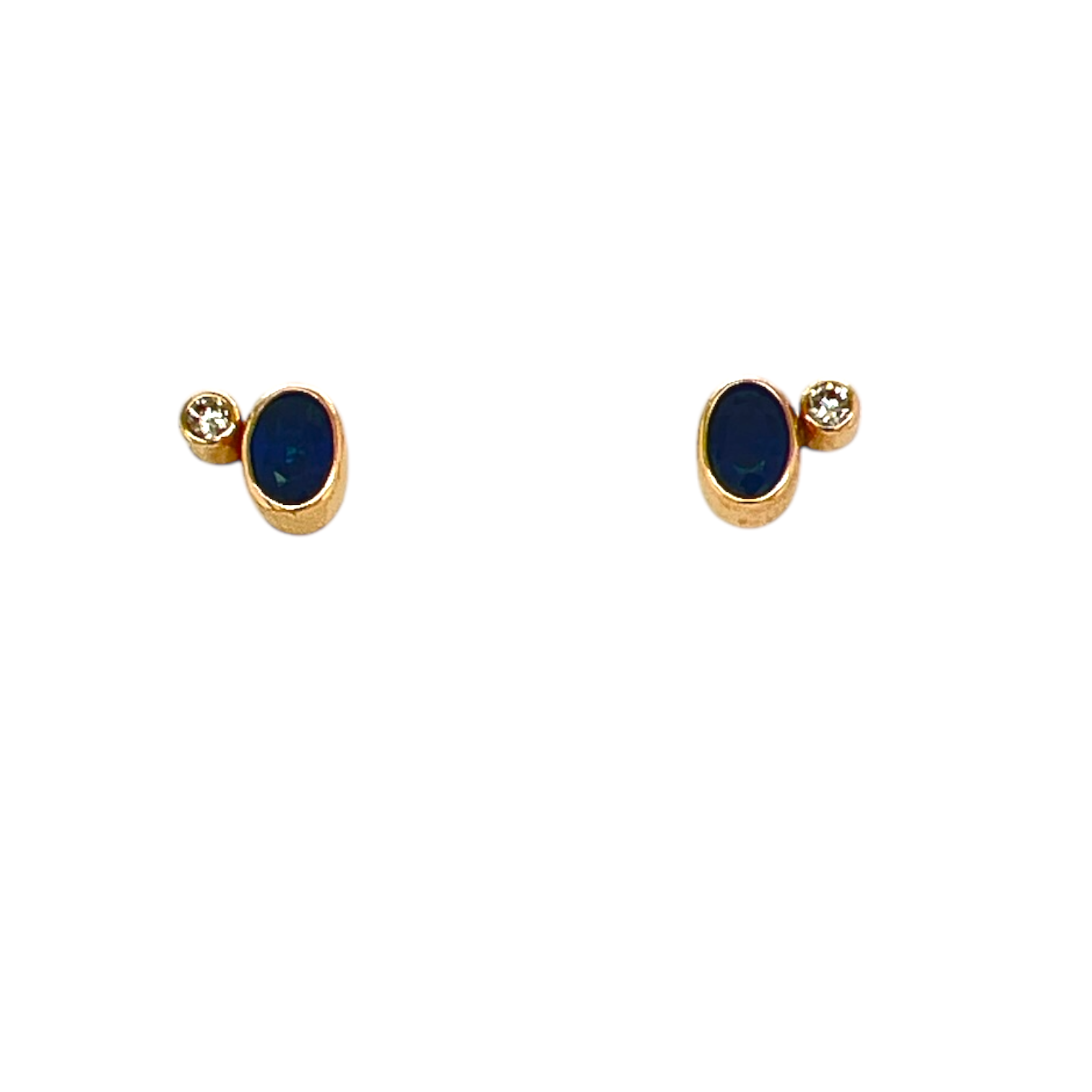 Ørestikker i 14kt guld med diamanter og safir